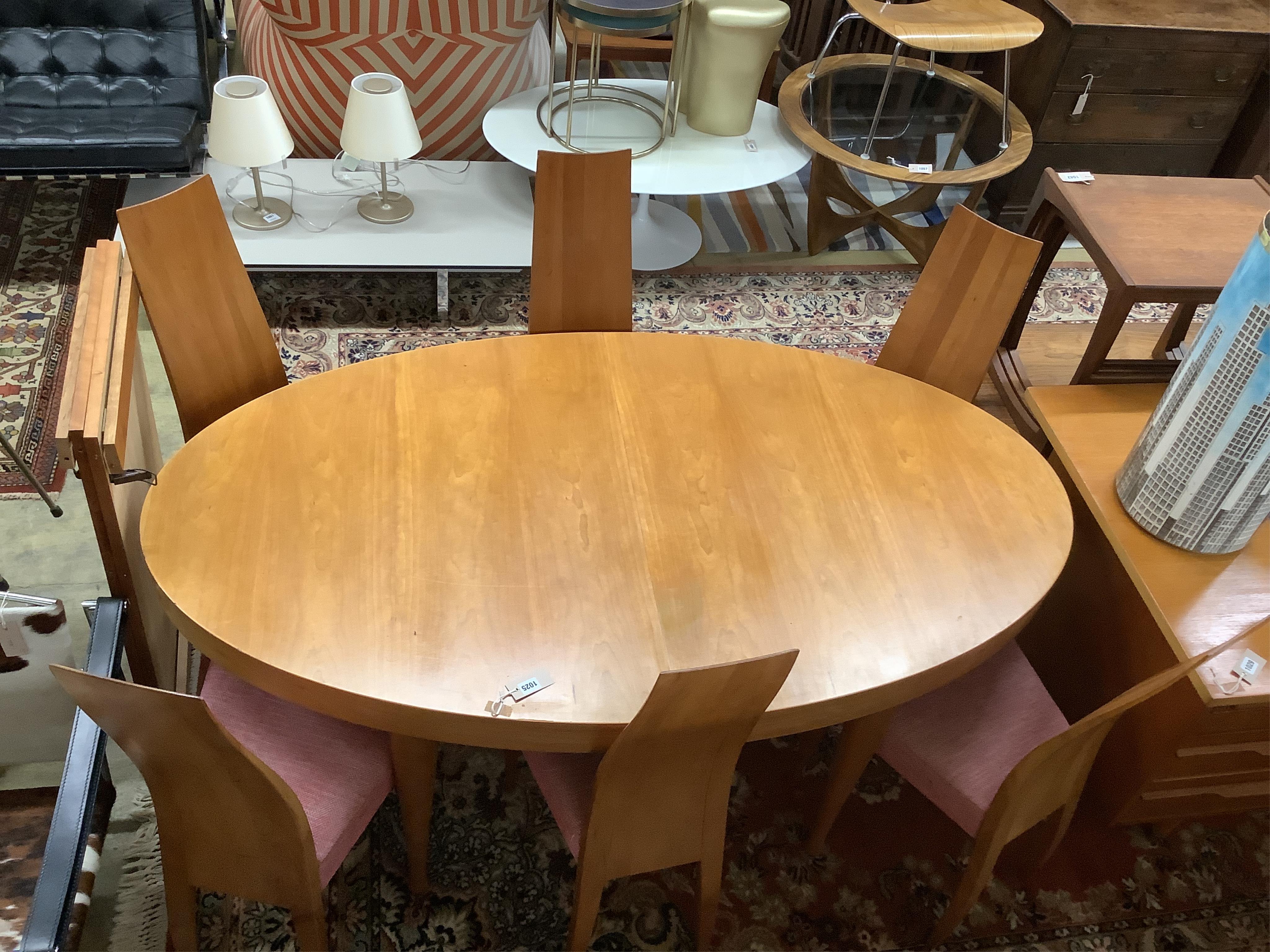 A Gudme Mobelfabrik dining room table, width 164cm, depth 94cm, height 72cm and six chairs. Condition - good